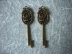 Lot de deux pendentifs clefs en bronze 58mm 