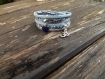 Bracelet 2 tours liberty " lamia " composé de liens en cuir bleu et argenté,sequin bleu en émail époxy et breloque om̐ 