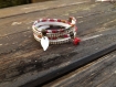 Bracelet 2 tours liberty " alba " composé d'un lien en daim clouté, clochette en verre tchèque et aile en nacre 