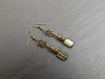 Boucles d'oreille " lauriane " composées de perles en verre tchèque ton vert et marron 