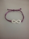 Bracelet infinity argenté avec fils nylon violet 