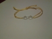 Bracelet infinity brillant couleur jaune 