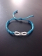 Bracelet infinity argenté avec tissage shamballa 