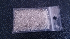 Perles rocailles couleur cristal, centre métallisé 2mm sachet 10gr 