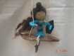 Création figurine poupée sur sa balançoire feutrine , laine et fil de fer pièce unique fait main 