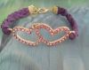 Bracelet " coeur entrelacé rose et strass" suedine violet tressé 