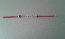 Bracelet" love strass ", hematite, chaîne rouge 