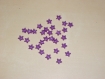 Lot de 30 perles étoiles violettes 