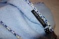 Une belle sortie de bain bleue avec un biais liberty bleu avec son gant assorti. 