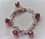 Bracelet grain de cafe perles en verre rouge 