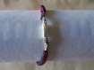 Bracelet avec cabochon papillon violet et cordon ciré tressé 