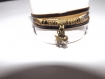 Bracelet en imitation cuir noir et or ,3 rangs , breloque feuille etoile , perle cristal grisee 