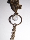 Bijou de créateur boucle d'oreille coloris bronze, "la flore cerclée" perle goutte en verre translucide 