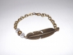 Jolie bracelet plume ethnique , bronze avec perle cristal transparente 