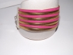Manchette/ bracelet à lannière doré et rose fuchsia, imitation cuir ,8 rangs 