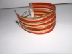 Manchette/ bracelet à lannière doré et rouge, imitation cuir ,8 rangs 