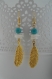 Boucles d'oreilles plume doré, perle bleu et coquillage blanc 