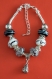 Bracelet "charms" noir, blanc et gris longueur 18 cm 