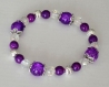 Bracelet en perles de cristal transparent et de verre violet 