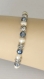 Bracelet en perles d'eau douce blanches et cristal bleu 