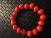 Bracelet perles et tète de mort rouge