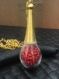 Collier avec pendentif goutte d'eau et perles de rocailles rouge