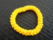Bracelet perles plastique jaune 