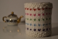 Housse de mug en laine blanche tricoté main 