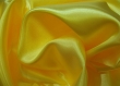 Doublure uni jaune or en polyester/vendu au mètre 