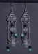 Boucles d'oreilles argentées hibou perles noires et turquoises 