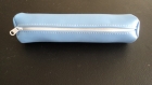 Trousse cylindrique en skaï bleu fg blanche