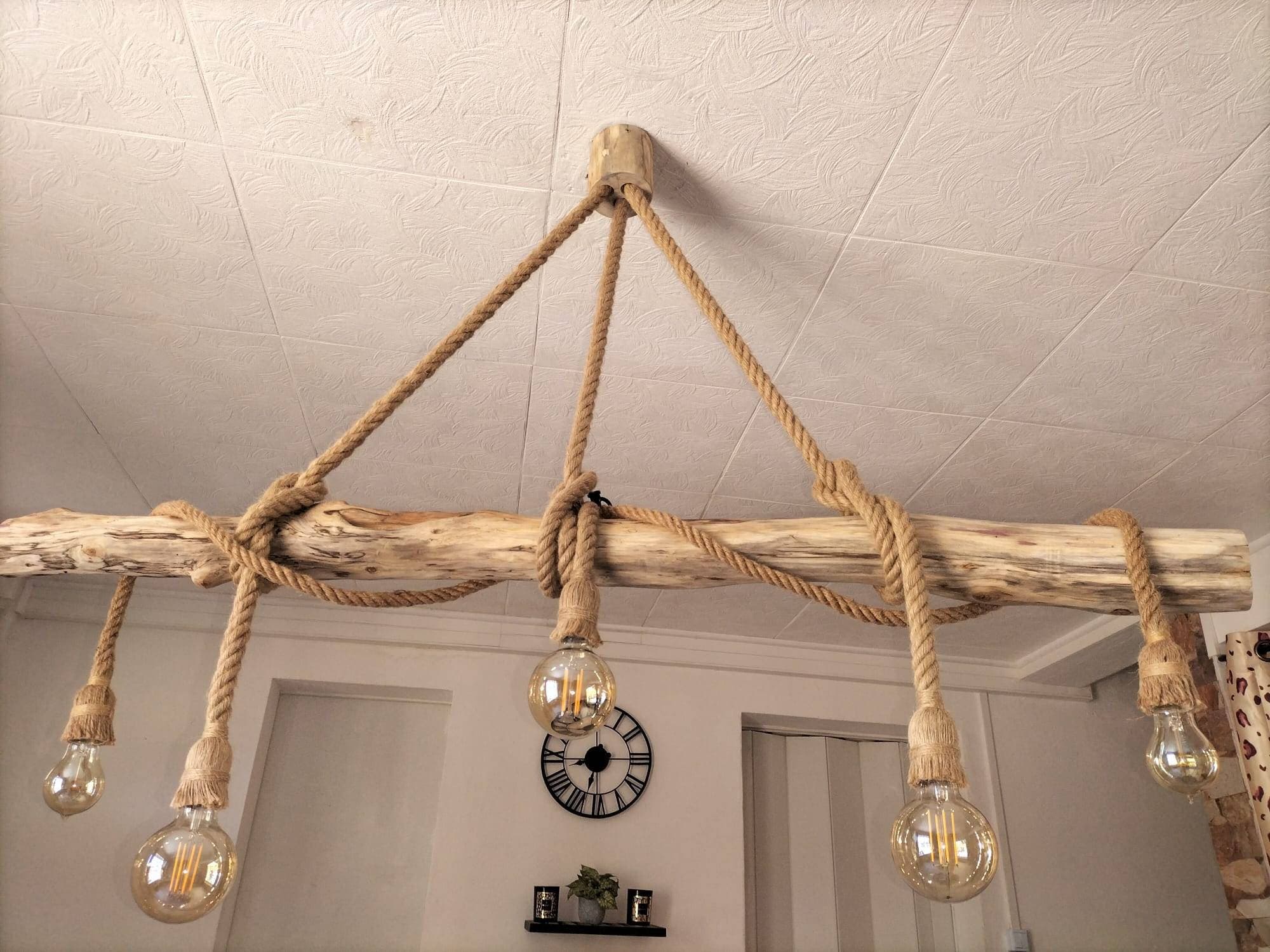 Suspension en bois flotté sculpté - de l'Atelier Arguins