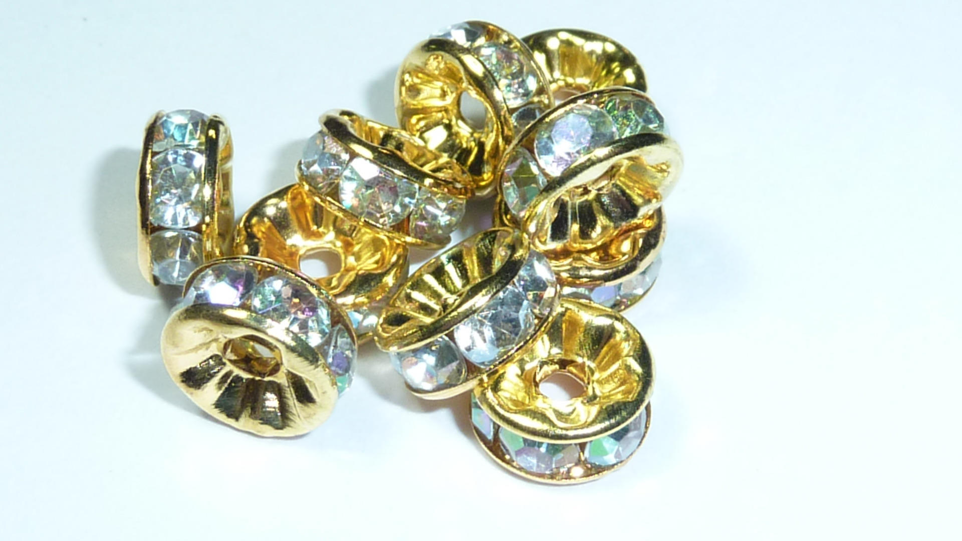 Guoxin Lot de 100 perles d'espacement rondes en cristal tchèque avec strass plaqué argent pour fabrication de bracelets, colliers, bijoux (4 mm, blanc doré